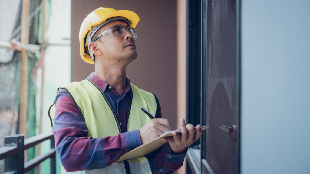 engineer inspecting home