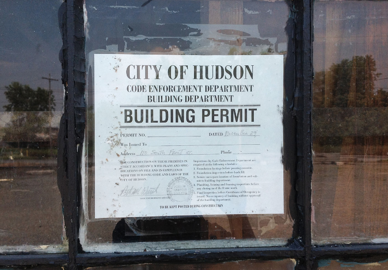 A building permit from the city of hudson