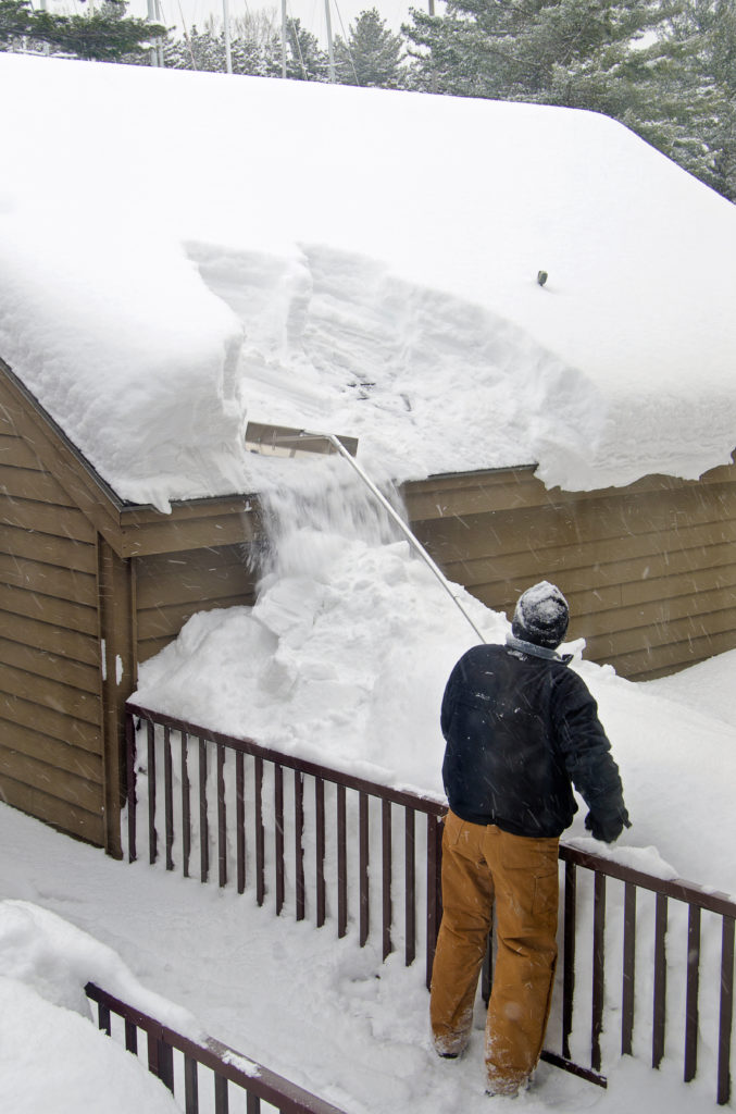 raking snow off roof 