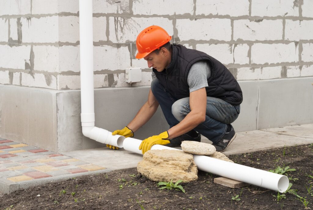 downspout extension used to carry water away from the home's foundation