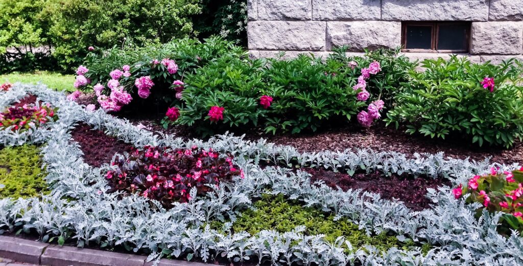 Flower bed around foundation preventing standing water around  foundation 