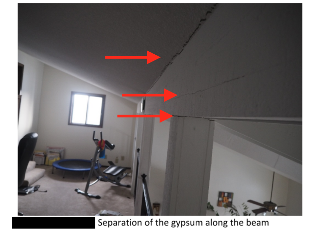 settlement, structural movement in the form of wall and ceiling cracks
 