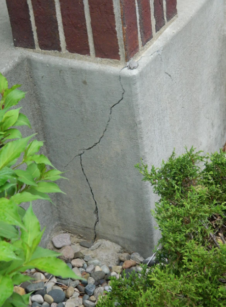 Foundation cracking due to frost heave.