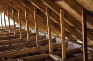 Braces connecting the roof rafters to the ceiling joists below