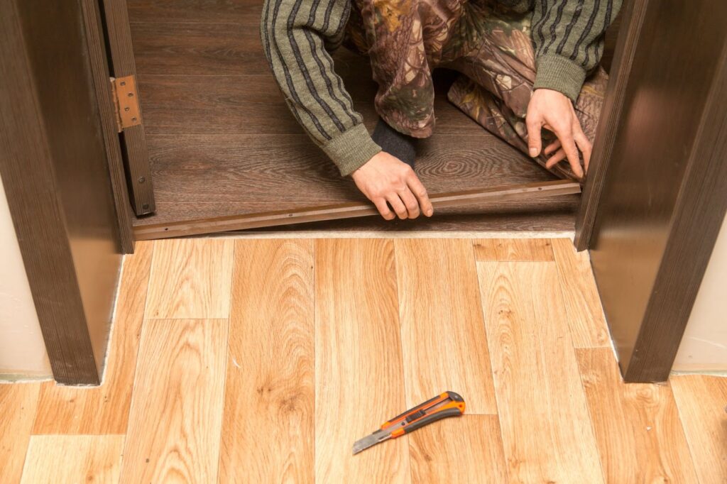 Door threshold being installed