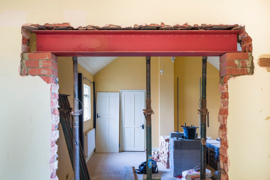 deconstructed steel beam in house