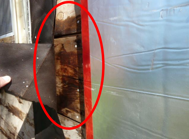 This photo shows moisture on the wall sheathing behind the pre-existing felt paper. CBS engineers determined that this was due to negative pitch of the exterior sill, caulking failure and lack of window flashing.